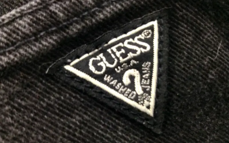 is guess a luxury brand